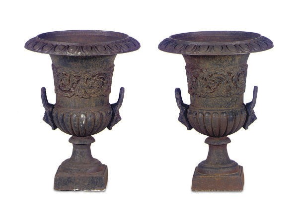 A PAIR OF CAST IRON GARDEN URNS,