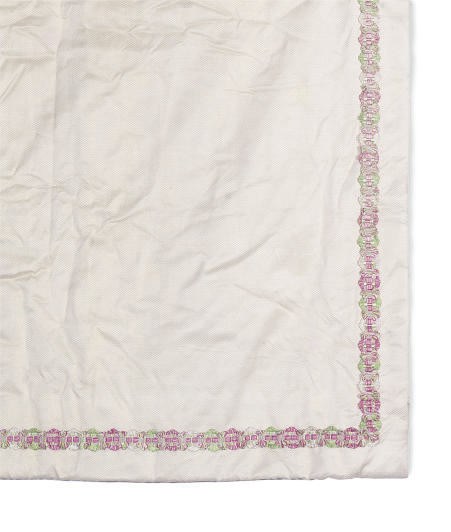 A GROUP OF WHITE AND PINK FLORAL CURTAINS,