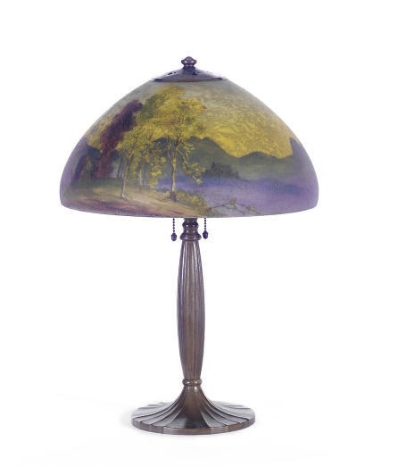 A PATINATED METAL AND REVERSE-PAINTED GLASS TABLE LAMP,
