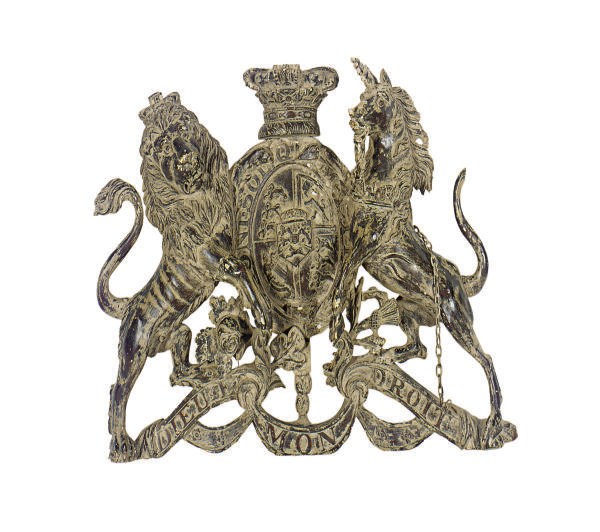 A GREY-PAINTED AND PARCEL-GILT BRITISH COAT OF ARMS,