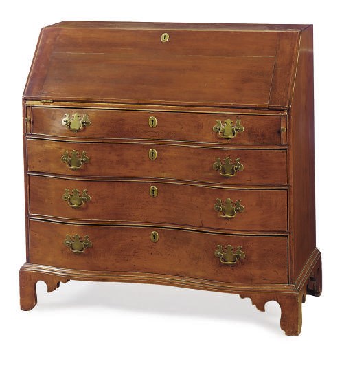 AN AMERICAN CHIPPENDALE BIRCHWOOD SERPENTINE SLANT-FRONT DESK,