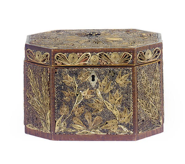 AN ENGLISH OCTAGONAL-FORM QUILLWORK TEA CADDY,