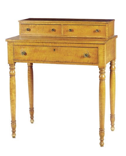 AN AMERICAN TIGER MAPLE SIDE TABLE,