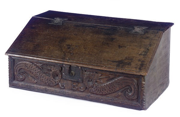 AN ENGLISH OAK TABLE-TOP BUREAU,