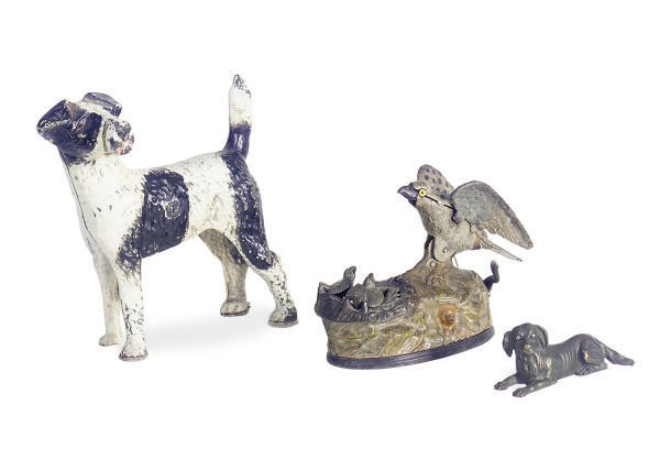 AN AMERICAN PAINT-DECORATED IRON FIGURAL BANK,