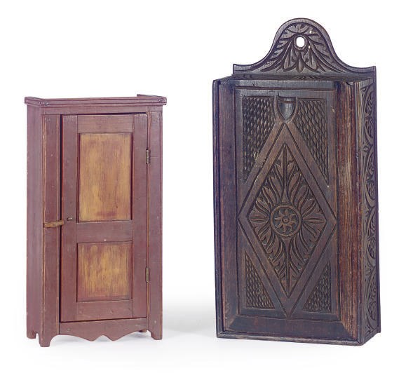A CARVED OAK HANGING SALT BOX,