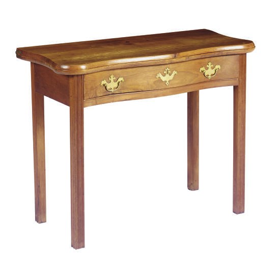 AN AMERICAN CHERRYWOOD FOLD-OVER GAMES TABLE,