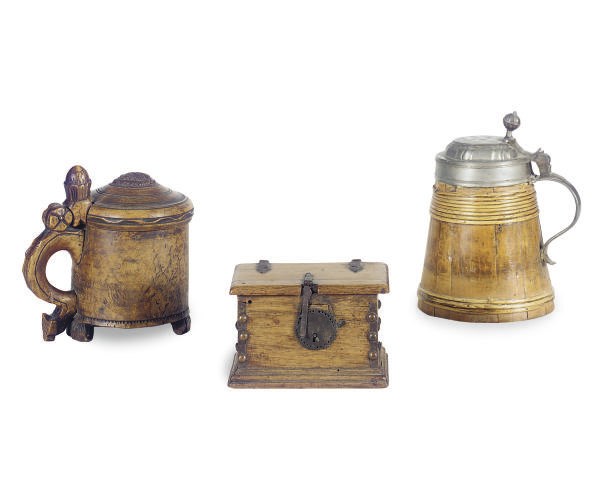 TWO CONTINETNAL WOOD TANKARDS,