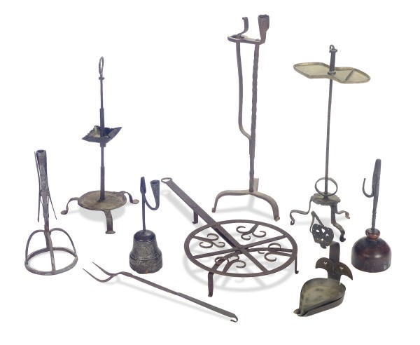 AN ASSORTED GROUP OF WROUGHT IRON CANDLESTICKS AND KITCHEN IMPLEMENTS,