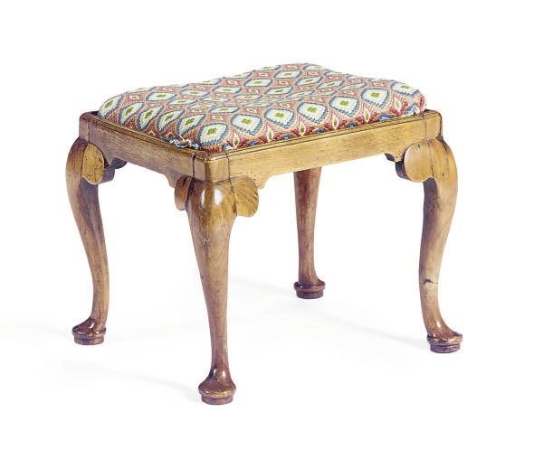 AN ENGLISH WALNUT STOOL,