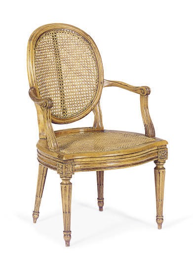 A LOUIS XVI BEECHWOOD AND CANED FAUTEUIL,