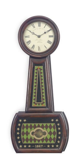 AN AMERICAN ROSEWOOD BANJO CLOCK**,