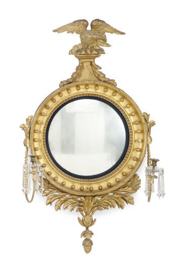 AN REGENCY GILTWOOD AND CUT-GLASS CONVEX GIRANDOLE MIRROR,