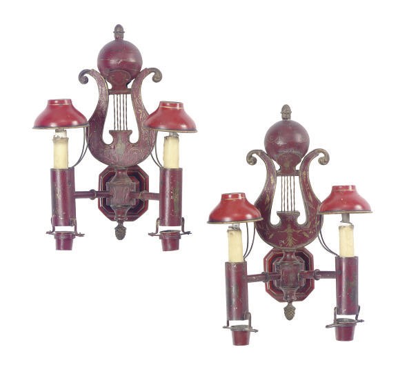 A MATCHED PAIR OF RED TOLE-PEINTE LYRE-FORM TWO-LIGHT WALL-LIGHTS,
