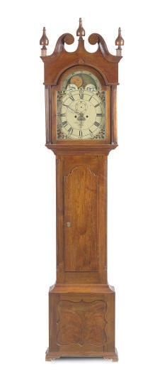 A GEORGE III WALNUT TALL-CASE CLOCK,