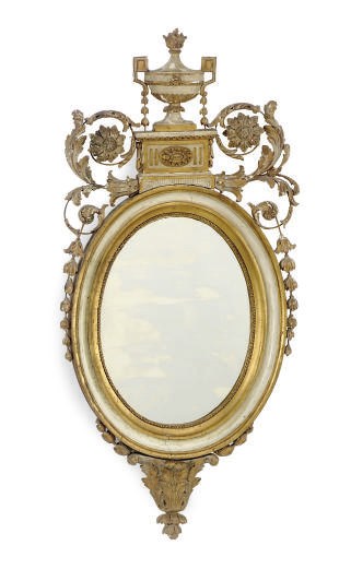 AN ITALIAN NEOCLASSICAL CREAM-PAINTED AND PARCEL-GILT MIRROR,