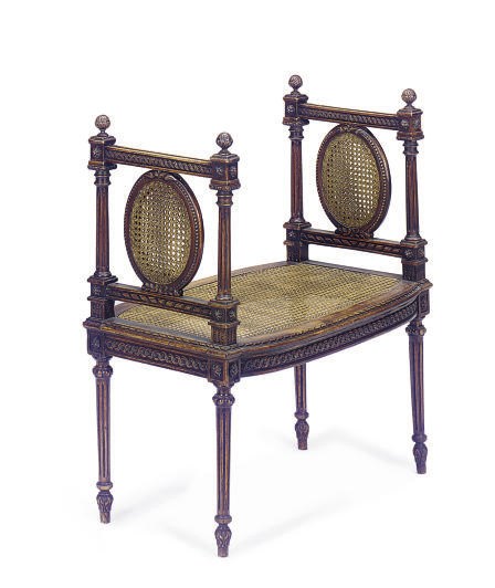 A FRENCH STAINED BEECHWOOD AND CANED WINDOW BENCH,