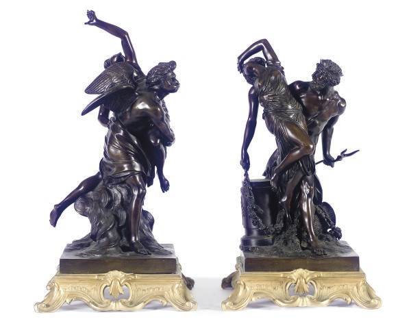 A PAIR OF PATINATED BRONZE FIGURAL GROUP,