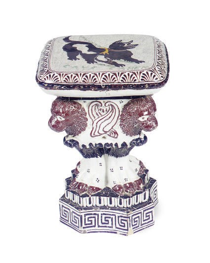 A CERAMIC POLYCHROME-DECORATED 'CAVE CANEM' GARDEN STOOL,
