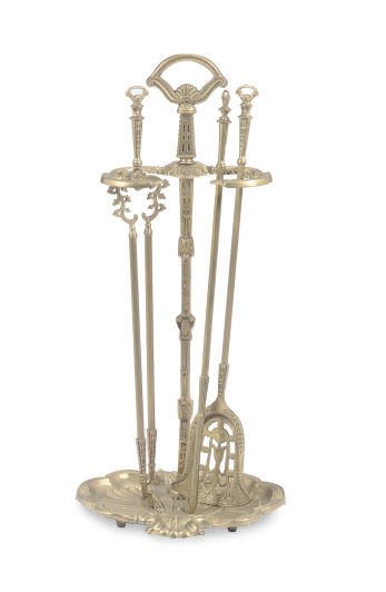 A SET OF BRASS FIRE TOOLS,