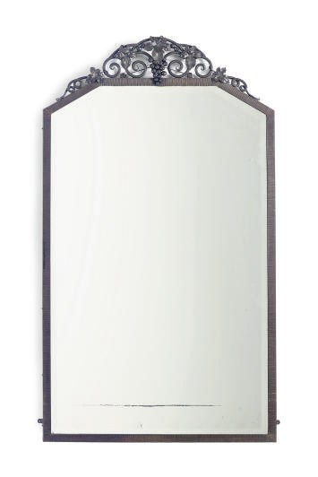 A WROUGHT IRON MIRROR,