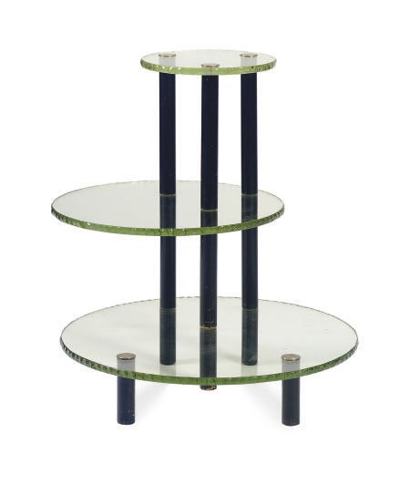 AN EBONIZED AND GREEN-COLORED GLASS THREE-TIER TABLE,