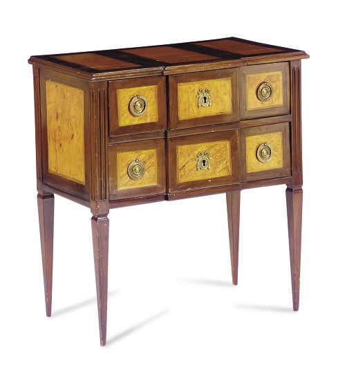 A NORTH EUROPEAN BIRCH AND MAHOGANY CHEST-OF-DRAWERS,