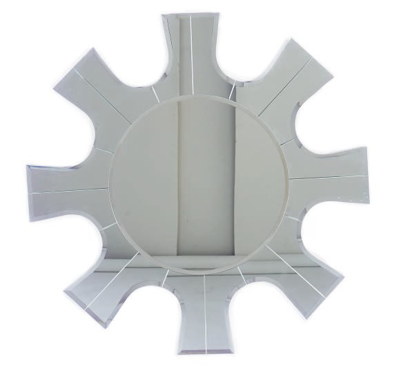 A BEVELED GLASS STARBURST-FORM MIRROR,