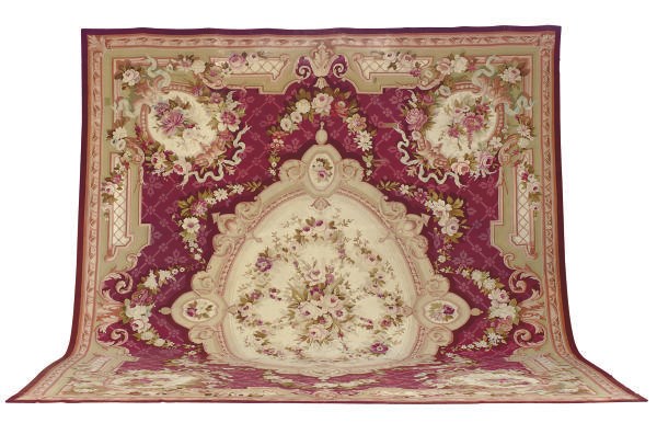 AN AUBUSSON CARPET,