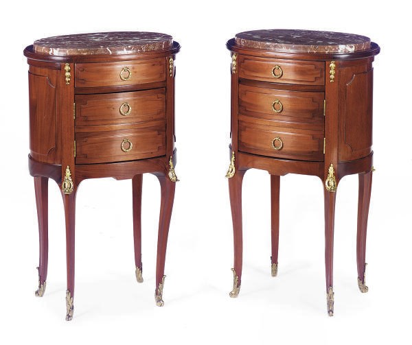 A PAIR OF FRENCH GILT-METAL MOUNTED MAHOGANY AND MARBLE-TOP OVAL BEDSIDE TABLES,