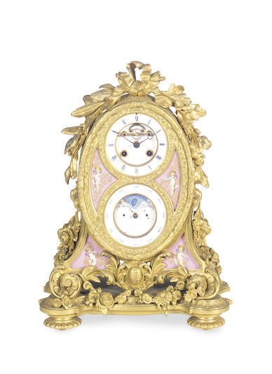 A FRENCH GILT-BRONZE AND PORCELAIN MANTELCLOCK,