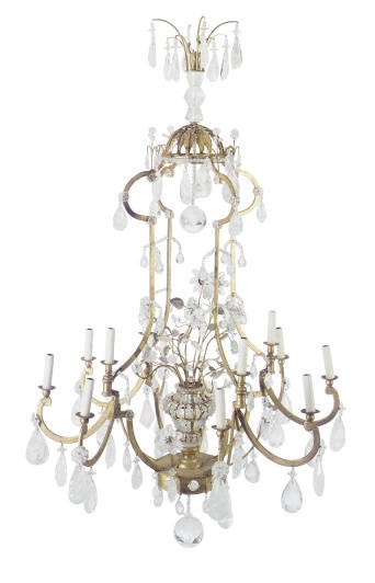 A PAIR OF GILT-METAL, ROCK-CRYSTAL AND MOLDED-GLASS TWELVE-LIGHT CHANDELIERS,