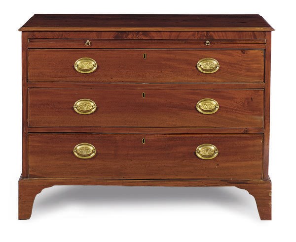 AN ENGLISH MAHOGANY CHEST-OF-DRAWERS,
