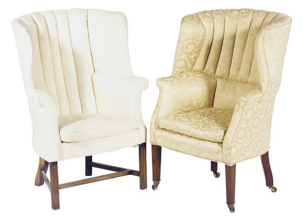 TWO LATE GEORGE III MAHOGANY AND UPHOLSTERED WINGBACK ARMCHAIRS,