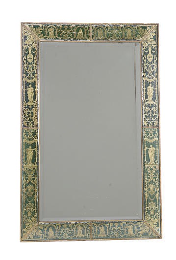A GREEN AND GILT VERRE EGLOMISE MIRROR,
