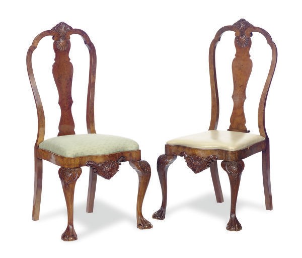 A SET OF FOUR WALNUT SIDE CHAIRS,