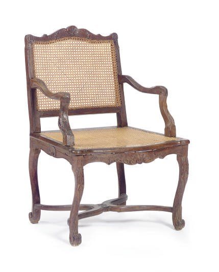 A REGENCE BEECHWOOD AND CANED FAUTEUIL,