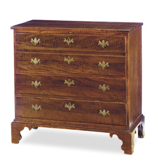 A CHIPPENDALE TIGER MAPLE CHEST-OF-DRAWERS,