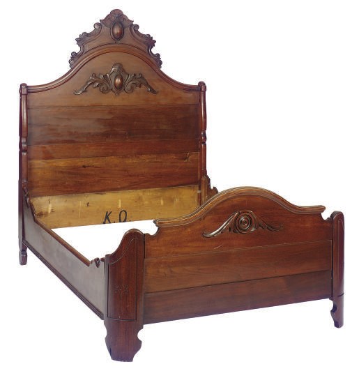 AN AMERICAN WALNUT AND OAK BED,