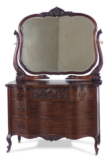 AN AMERICAN MAHOGANY SERPENTINE DRESSING-CHEST-OF-DRAWERS,