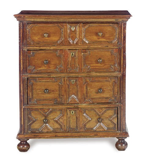 A NORTH EUROPEAN STAINED PINE CHEST-OF-DRAWERS,
