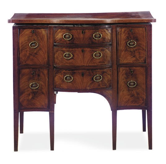 A LATE GEORGE III MAHOGANY SERPTENTINE LIFT-TOP SIDEBOARD,