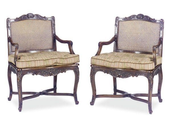 A PAIR OF STAINED-BEECHWOOD AND CANED FAUTEUILS,