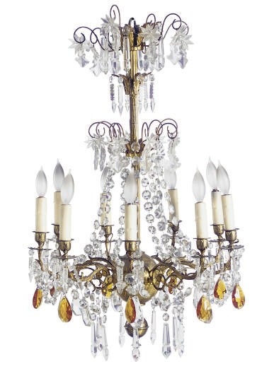 A CONTINENTAL GILT-METAL AND CUT-GLASS NINE-LIGHT CHANDELIER,