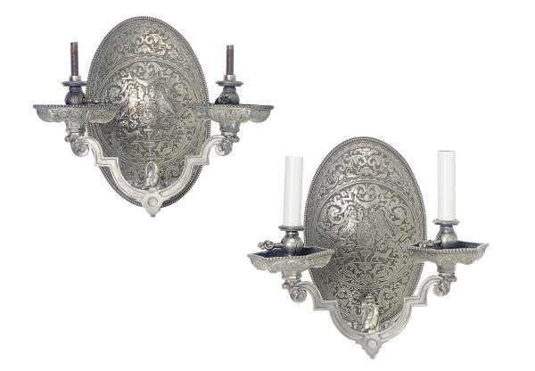 A PAIR OF SILVERED-METAL TWO-BRANCH WALL-LIGHTS,