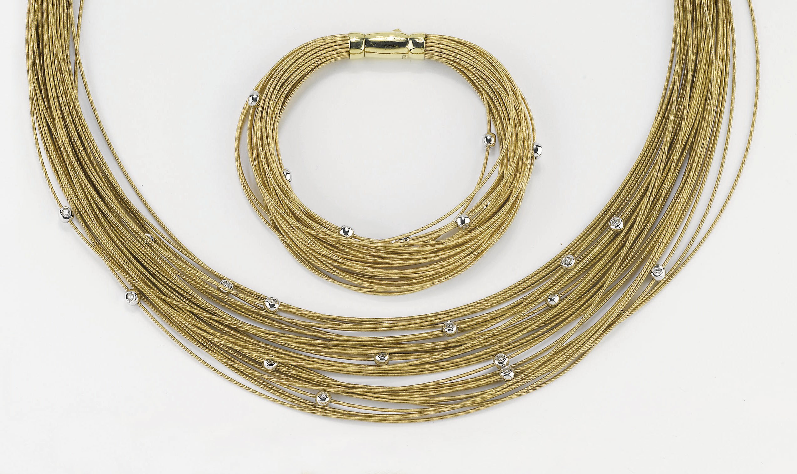 DEMI PARURE IN ORO E BRILLANTI