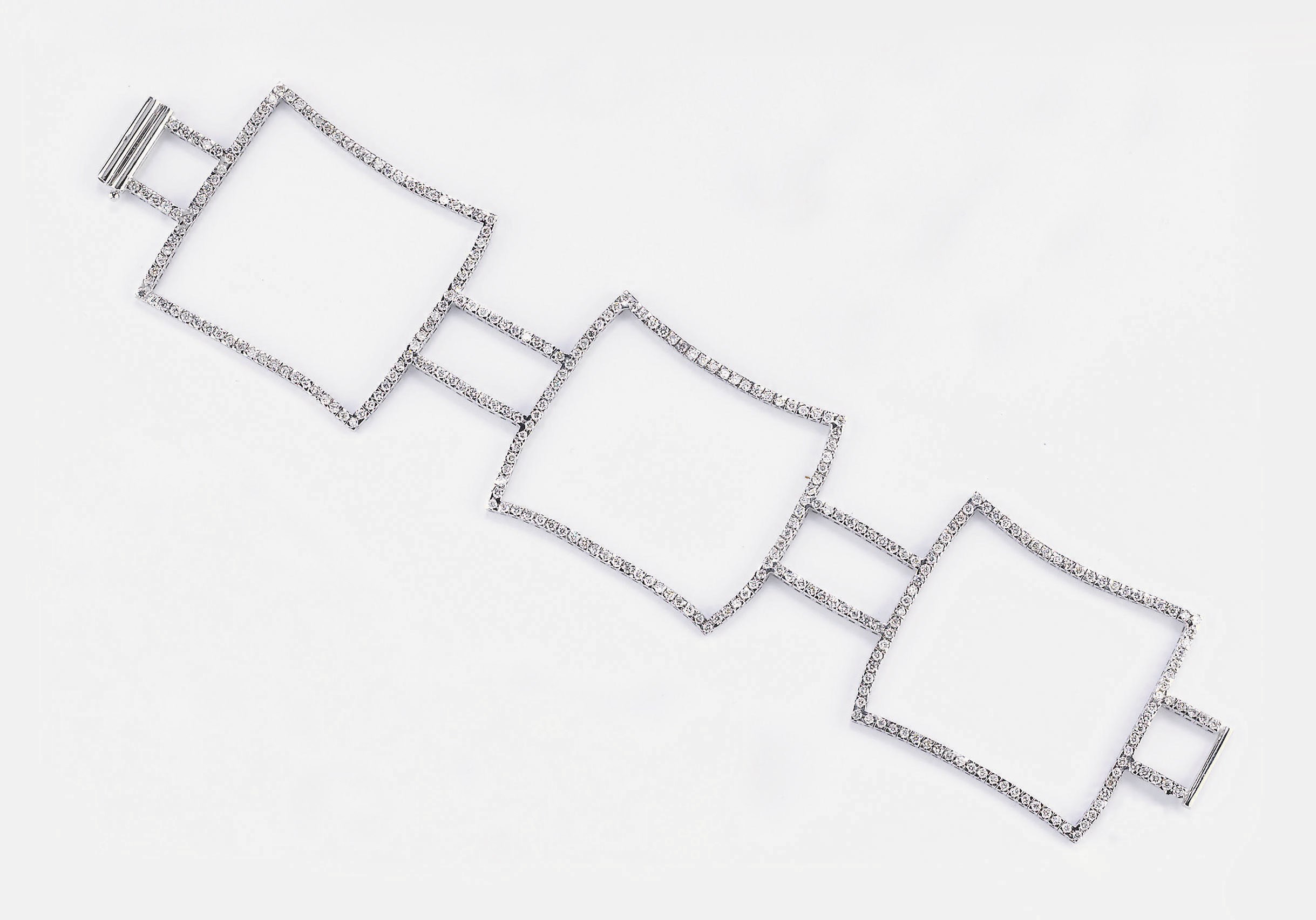 BRACCIALE A FASCIA SEMISNODATO IN ORO E DIAMANTI