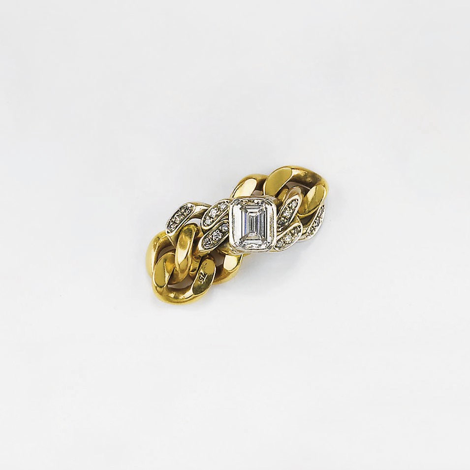 ANELLO A FASCIA SNODATA IN ORO BICOLORE E DIAMANTI, FIRMATO POMELLATO