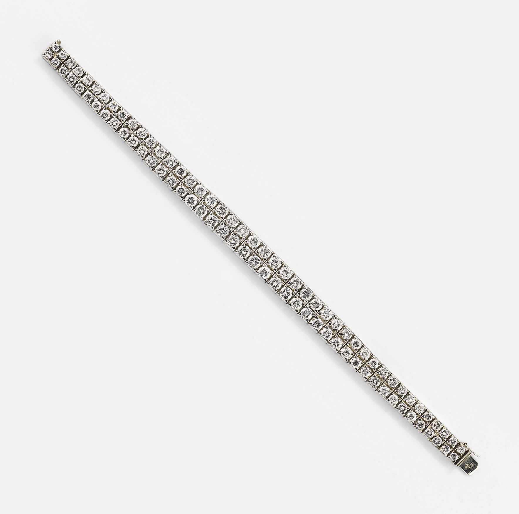 BRACCIALE SEMISNODATO IN ORO E DIAMANTI