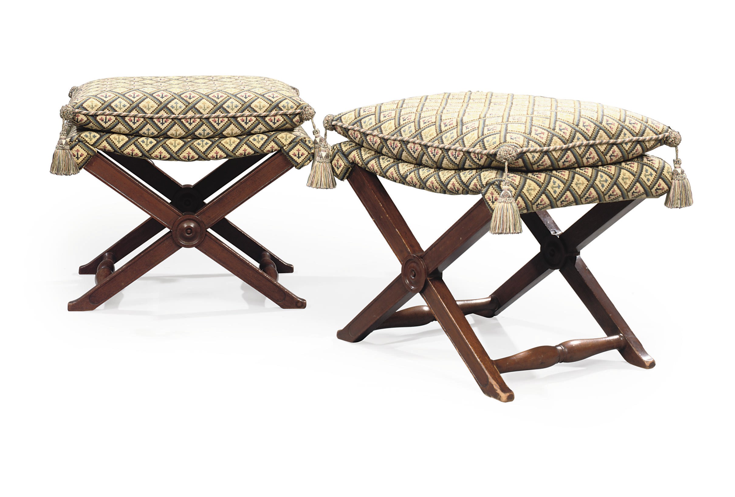 A PAIR OF EMPIRE MAHOGANY X-FRAME FOLDING STOOLS